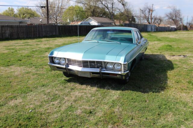 1967 Teal Chevrolet Impala Sedan