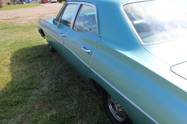 1967 Teal Chevrolet Impala Sedan