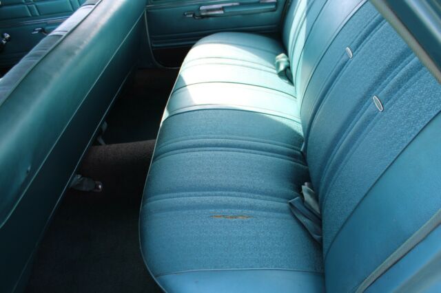 1967 Teal Chevrolet Impala Sedan