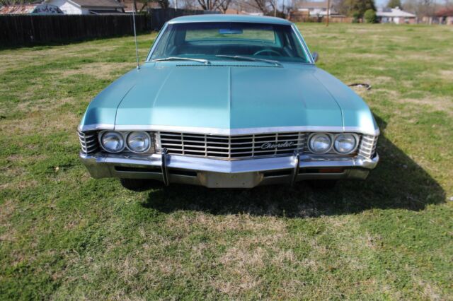 1967 Teal Chevrolet Impala Sedan