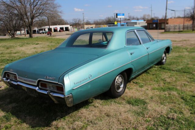 1967 Teal Chevrolet Impala Sedan