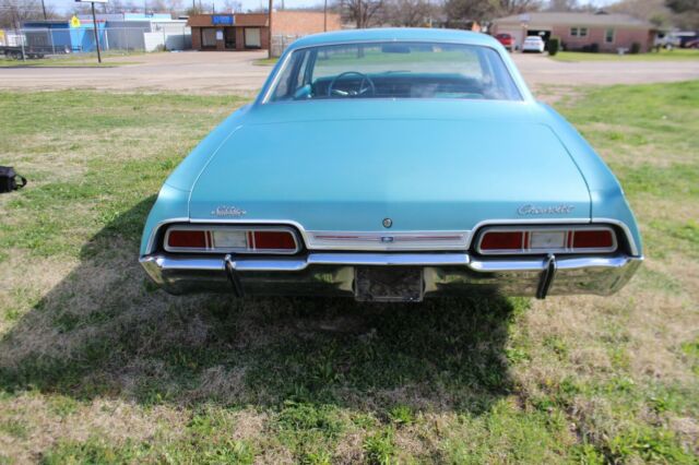 1967 Teal Chevrolet Impala Sedan