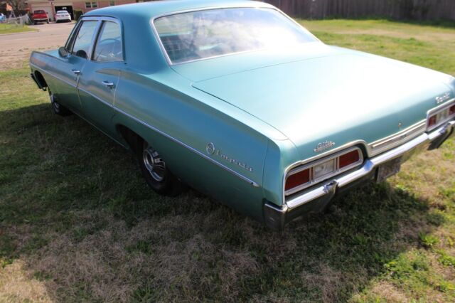 1967 Teal Chevrolet Impala Sedan