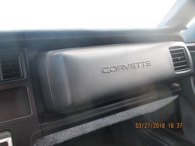 1985 Light Blue over Dark Blue Chevrolet Corvette Coupe