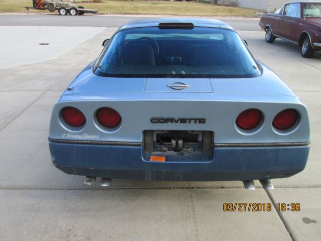 1985 Light Blue over Dark Blue Chevrolet Corvette Coupe