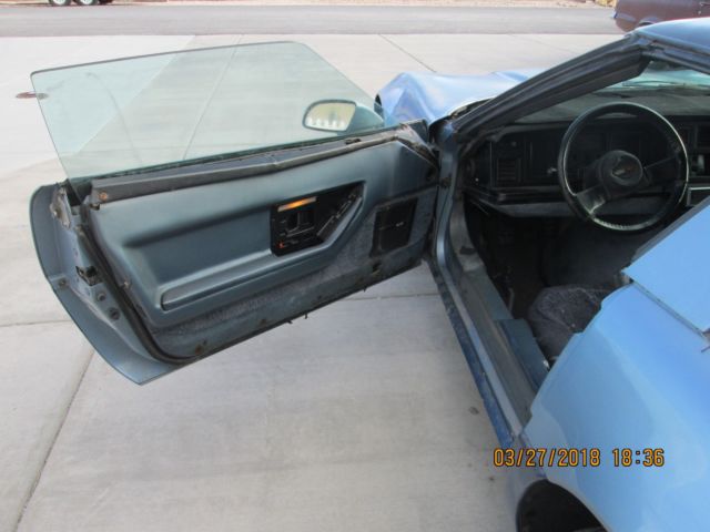 1985 Light Blue over Dark Blue Chevrolet Corvette Coupe