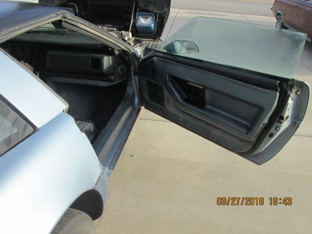 1985 Light Blue over Dark Blue Chevrolet Corvette Coupe