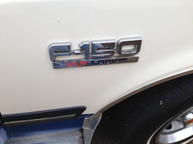 1990 White and Blue Ford F-150 Cab & Chassis