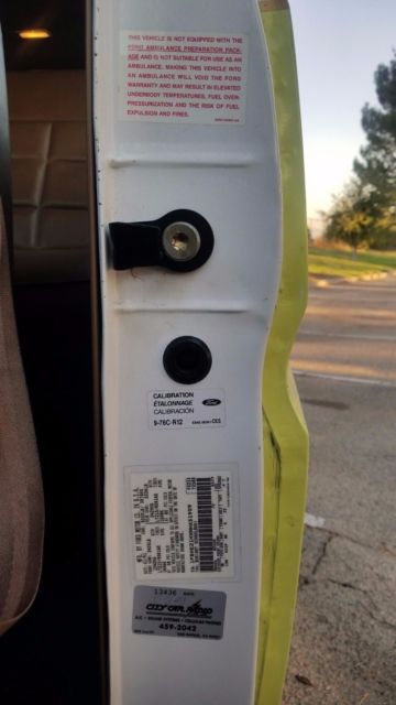 1991 Yellow Ford E-Series Van Standard Passenger Van