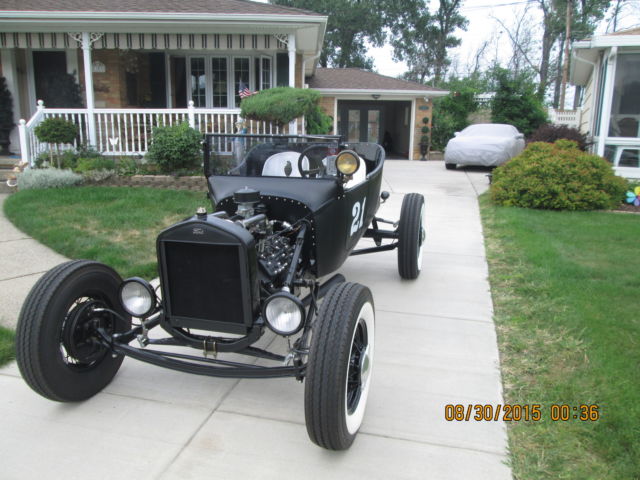 1921 semi flat black Ford Model T 1 door no top convertiable