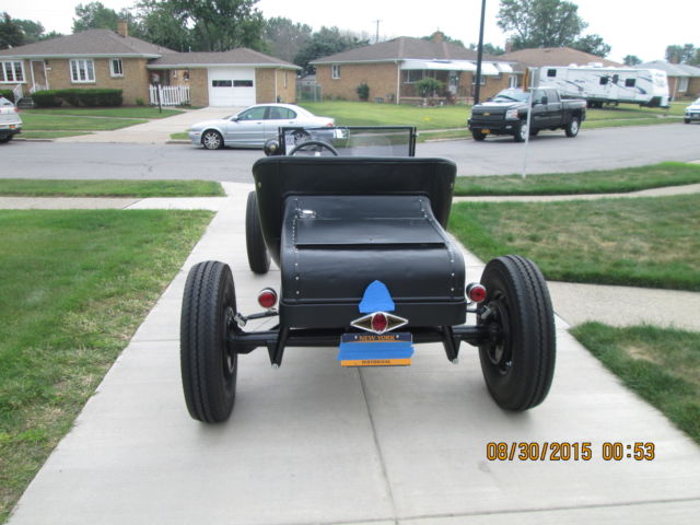 1921 semi flat black Ford Model T 1 door no top convertiable
