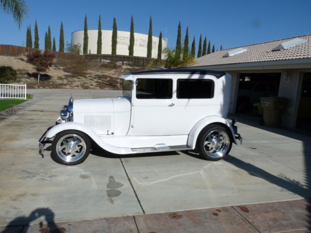 1928 White with pinstripe Ford Model A 2Door sedan