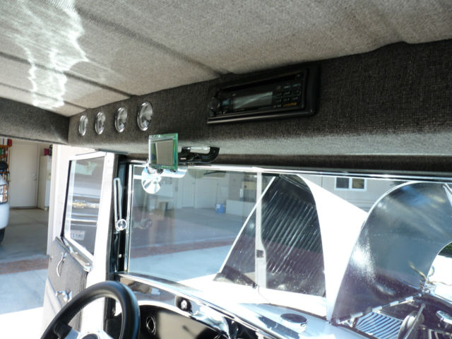 1928 White with pinstripe Ford Model A 2Door sedan