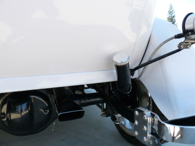 1928 White with pinstripe Ford Model A 2Door sedan