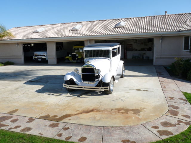 1928 White with pinstripe Ford Model A 2Door sedan