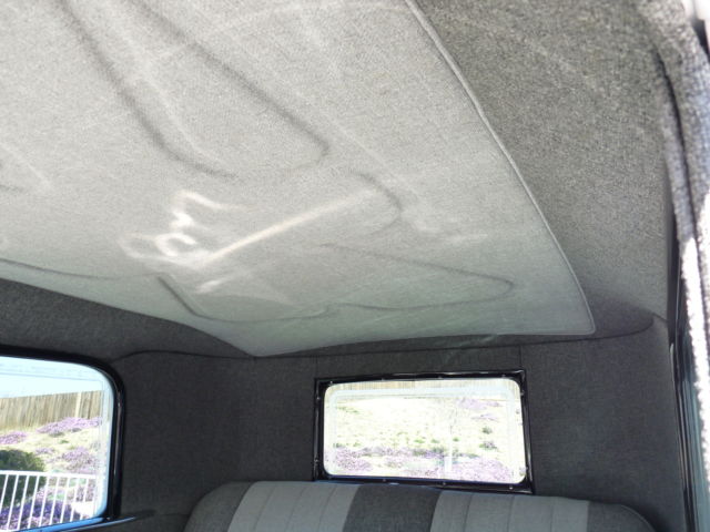 1928 White with pinstripe Ford Model A 2Door sedan