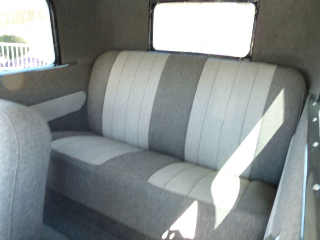 1928 White with pinstripe Ford Model A 2Door sedan