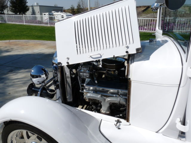 1928 White with pinstripe Ford Model A 2Door sedan