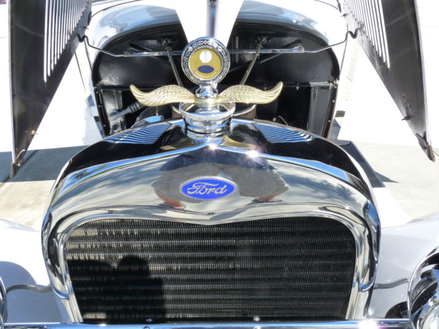 1928 White with pinstripe Ford Model A 2Door sedan