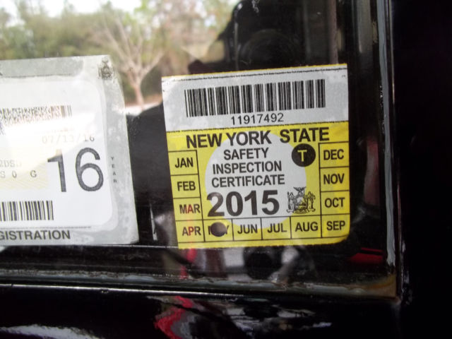 1928 red and black Ford Model A 2 door sedan