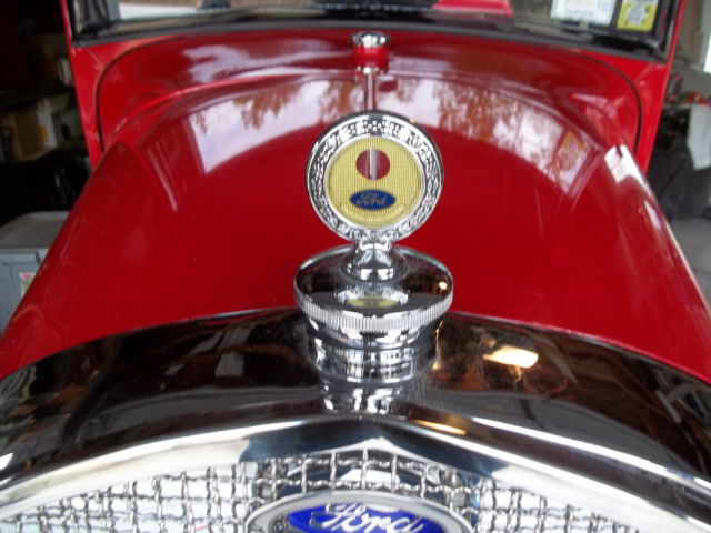 1928 red and black Ford Model A 2 door sedan