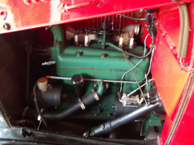 1928 red and black Ford Model A 2 door sedan