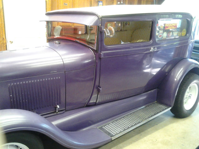 1928 purple Ford Model A two door sedan