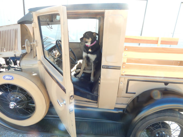 1928 brown and tan Ford Model A model a pickup
