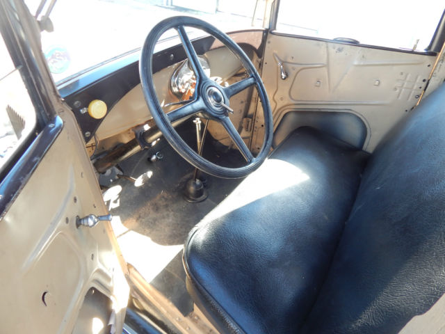 1928 brown and tan Ford Model A model a pickup