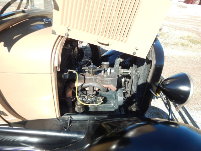 1928 brown and tan Ford Model A model a pickup