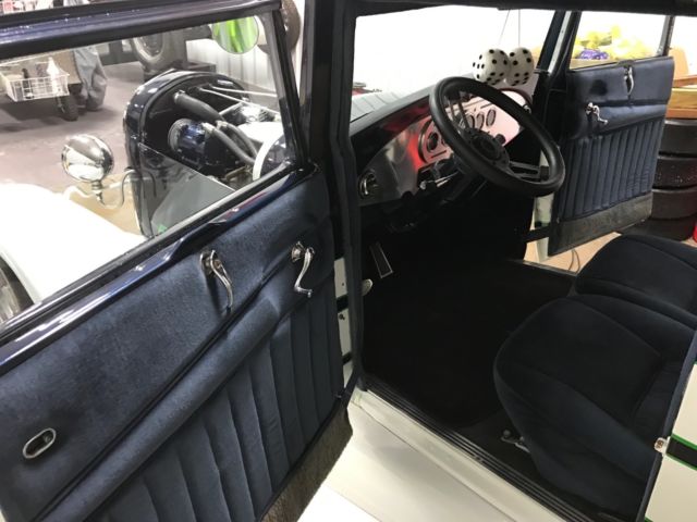 1928 bule/white Ford Model A Sedan