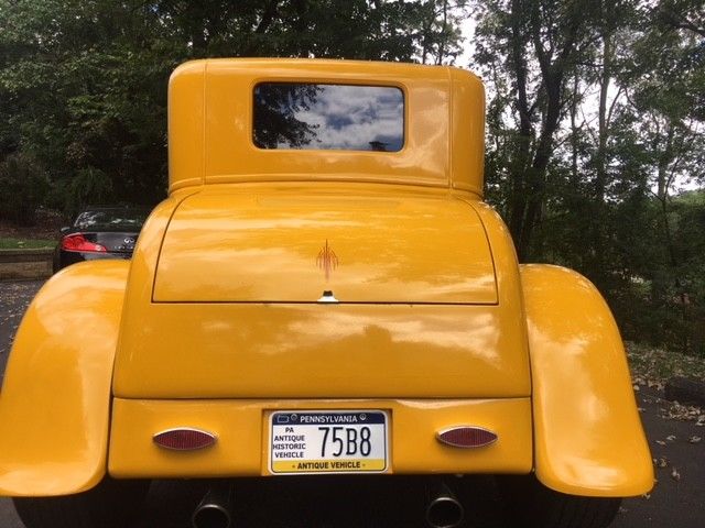 1929 Yellow Ford Model A Coupe