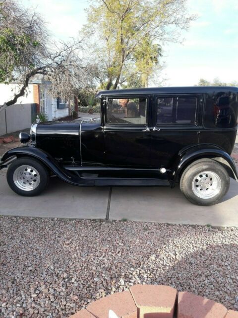 1929 Black Ford Model A 4 Door suicide doors
