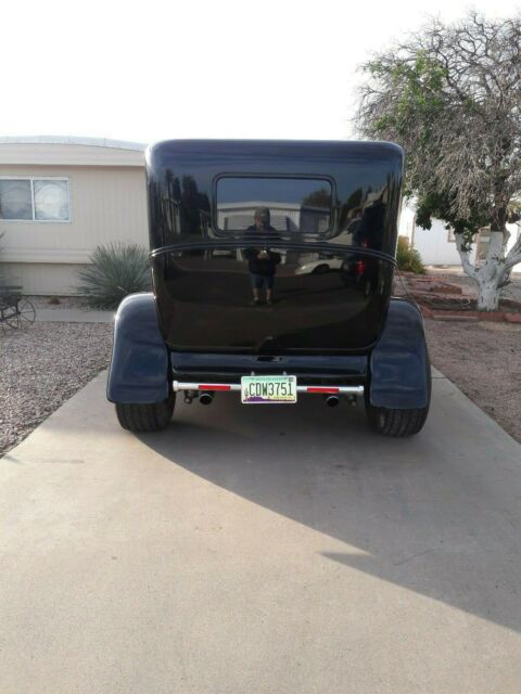 1929 Black Ford Model A 4 Door suicide doors