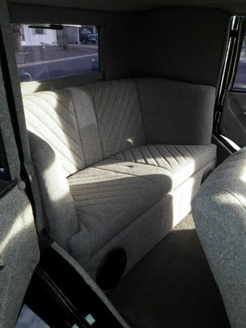 1929 Black Ford Model A 4 Door suicide doors