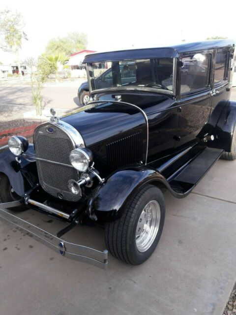 1929 Black Ford Model A 4 Door suicide doors