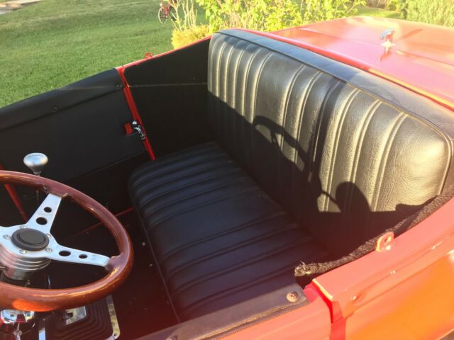 1929 Orange Ford Roadster Convertible