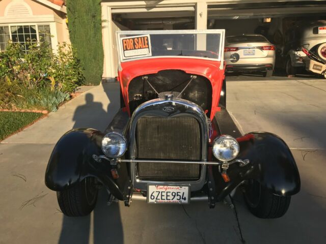 1929 Orange Ford Roadster Convertible