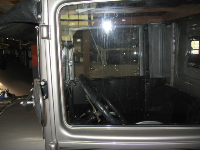 1929 silver and charcoal Ford Model A truck