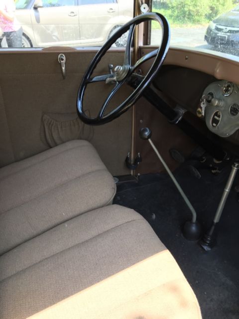 1929 Light Brown, Black Ford Model A Tudor
