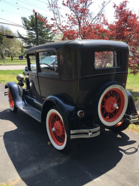 1929 Light Brown, Black Ford Model A Tudor