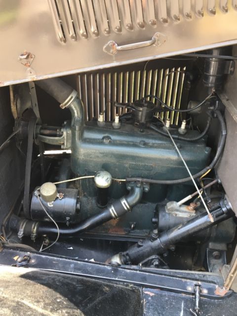 1929 Light Brown, Black Ford Model A Tudor