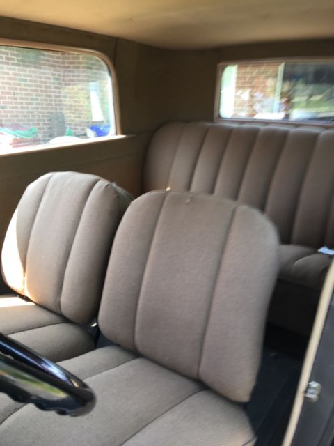 1929 Light Brown, Black Ford Model A Tudor