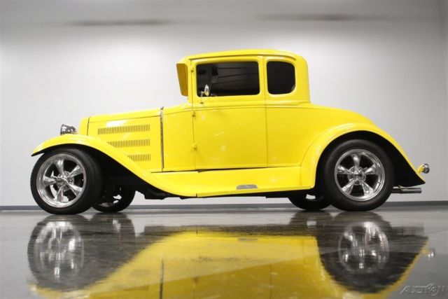 1930 Yellow Ford 5-Window