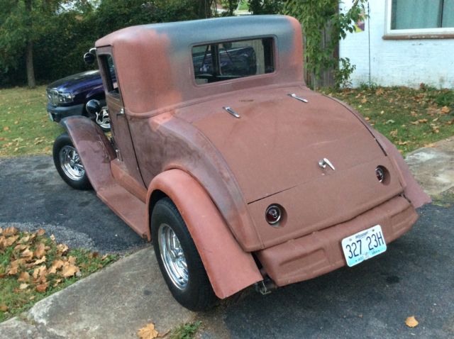 1930 Red primer Ford Model A 3 window coupe