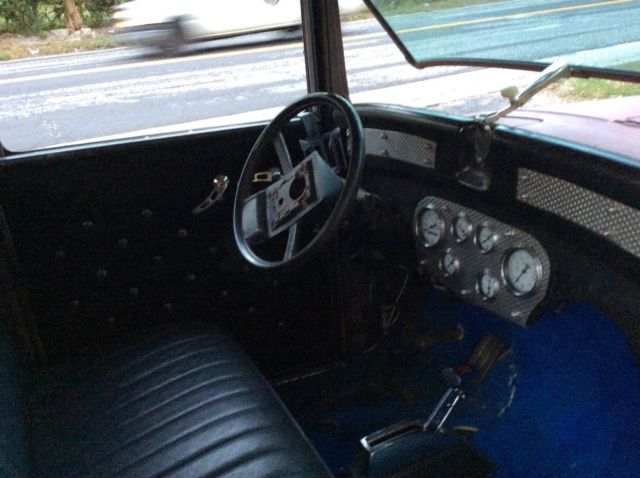 1930 Red primer Ford Model A 3 window coupe