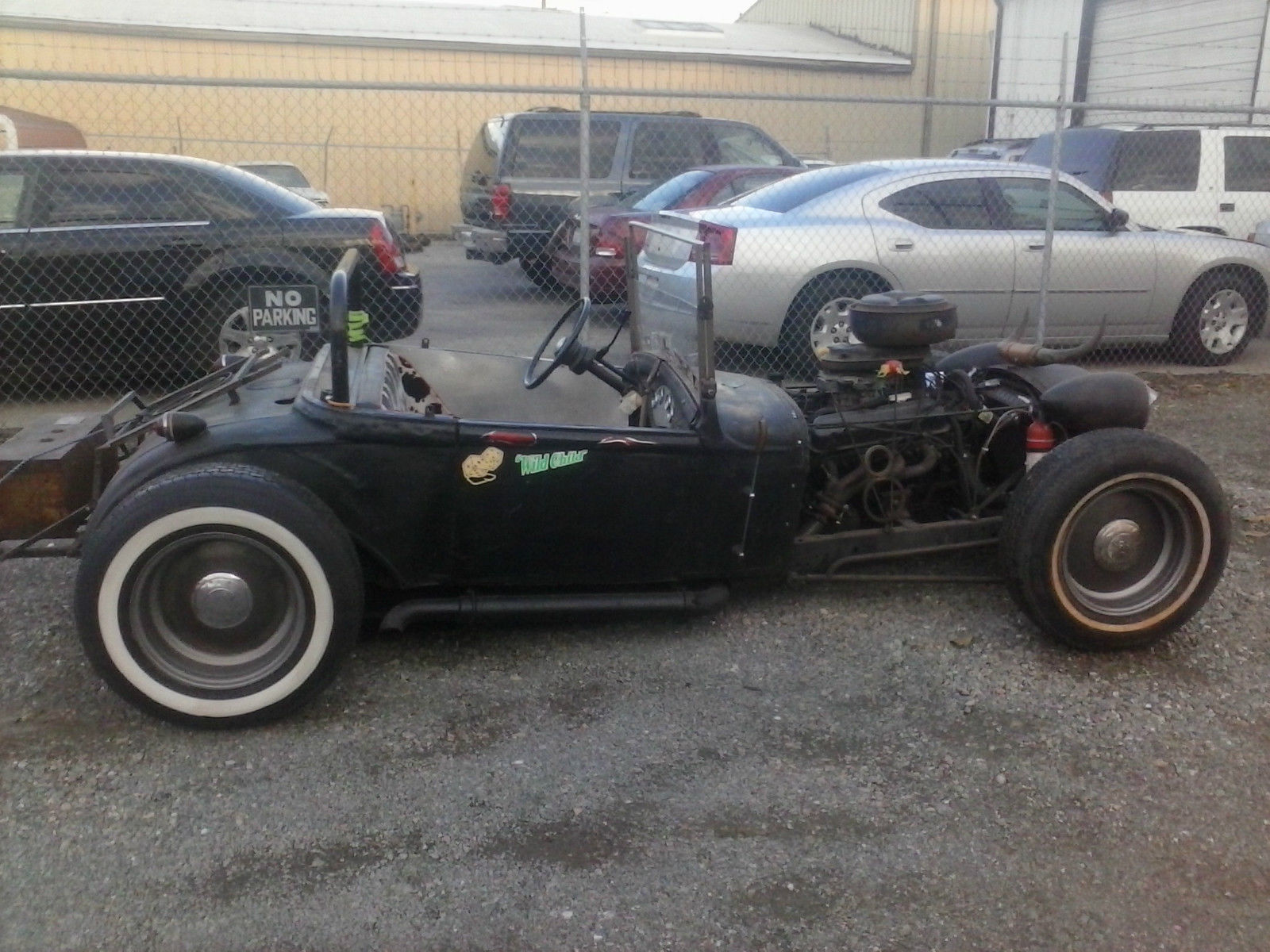 1930 flat blackand rust Ford Model A roadster