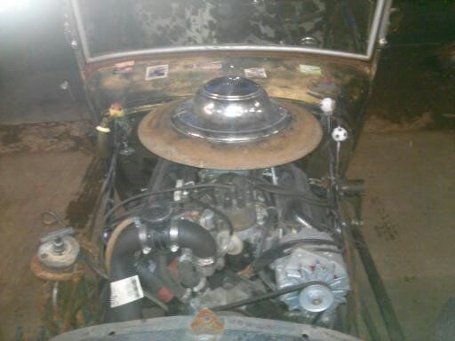 1930 flat blackand rust Ford Model A roadster