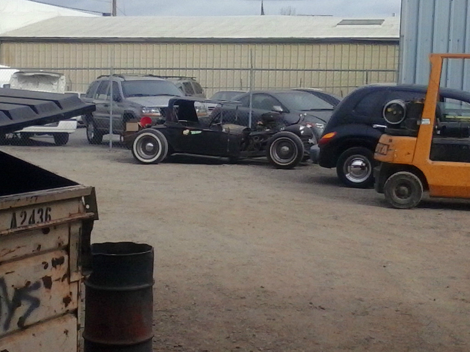 1930 flat blackand rust Ford Model A roadster