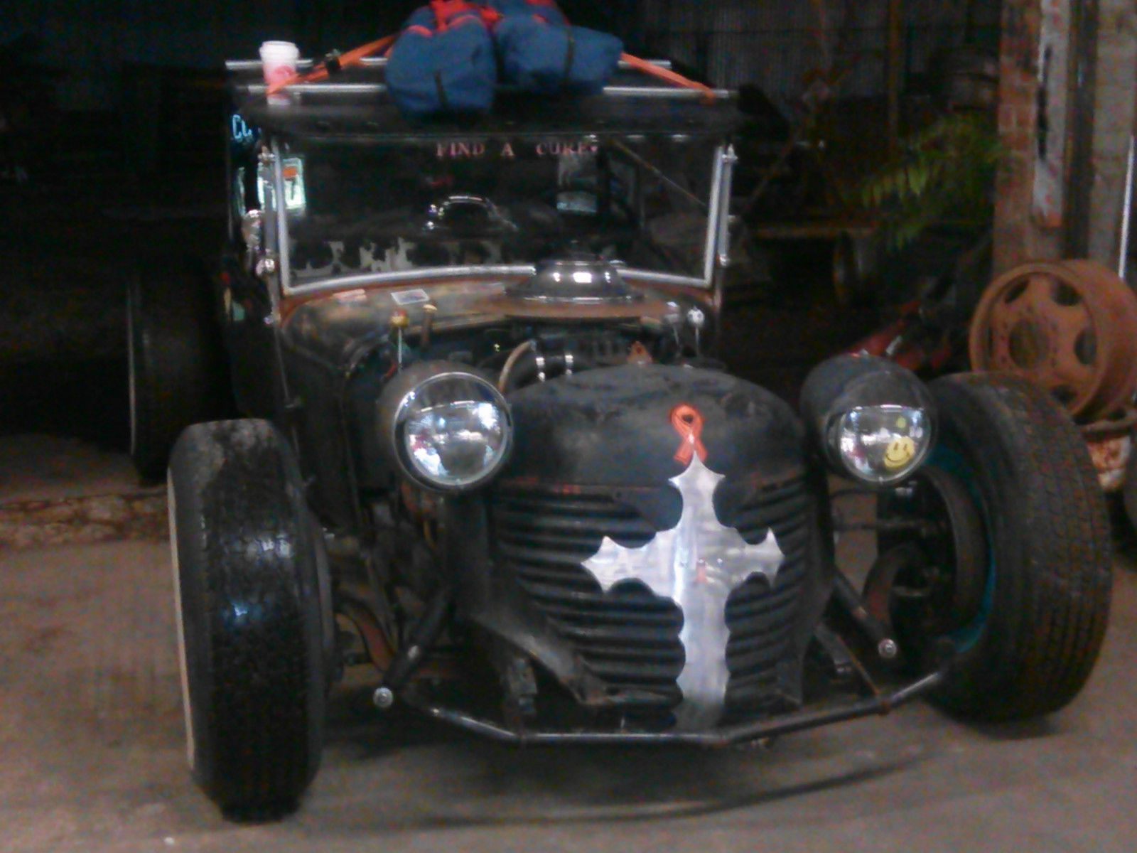 1930 flat blackand rust Ford Model A roadster